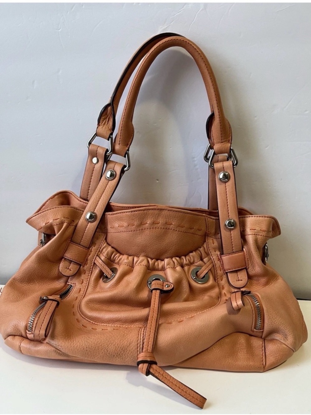 B. Makowsky Sigi BeBe tangerine leather shoulder bag